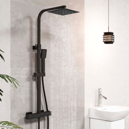 Doccia AICA con miscelatore termostatico e soffione quadrato 20x20 cm in acciaio inox, regolabile in altezza, colori disponibili: cromo o nero.