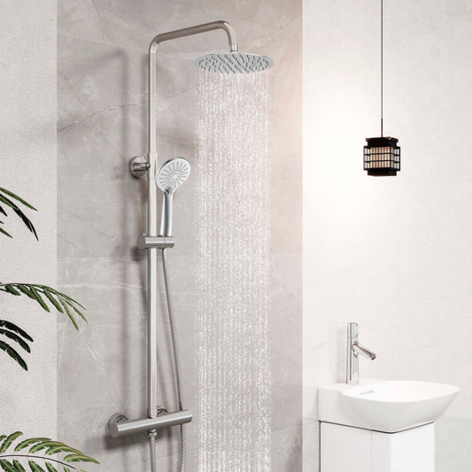 Sistema doccia AICA con miscelatore termostatico e soffione in acciaio inox da 20 cm di diametro, regolabile in altezza, color cromo.